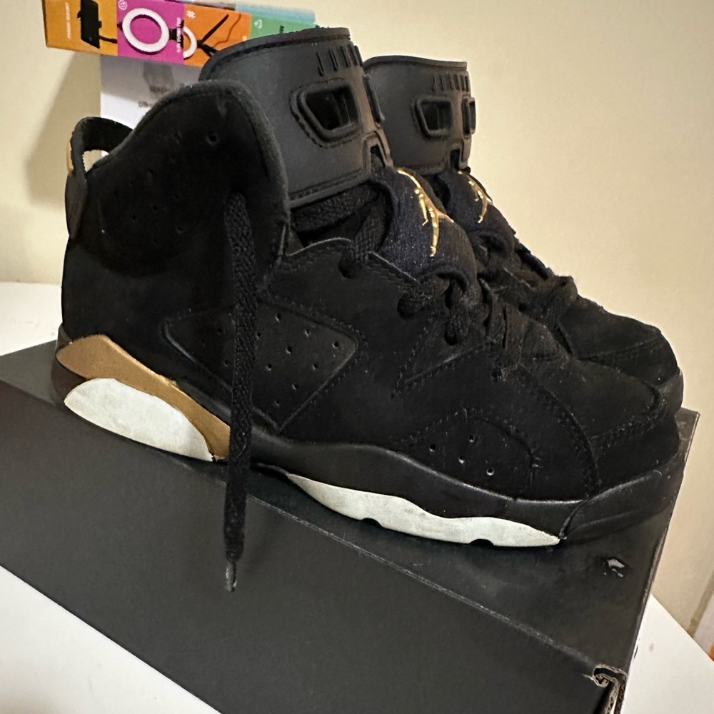 PS Jordan 6’s in black and gold